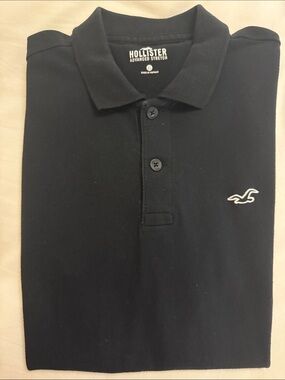 Hollister Men's Navy Black Polo with Embroidered Seagull